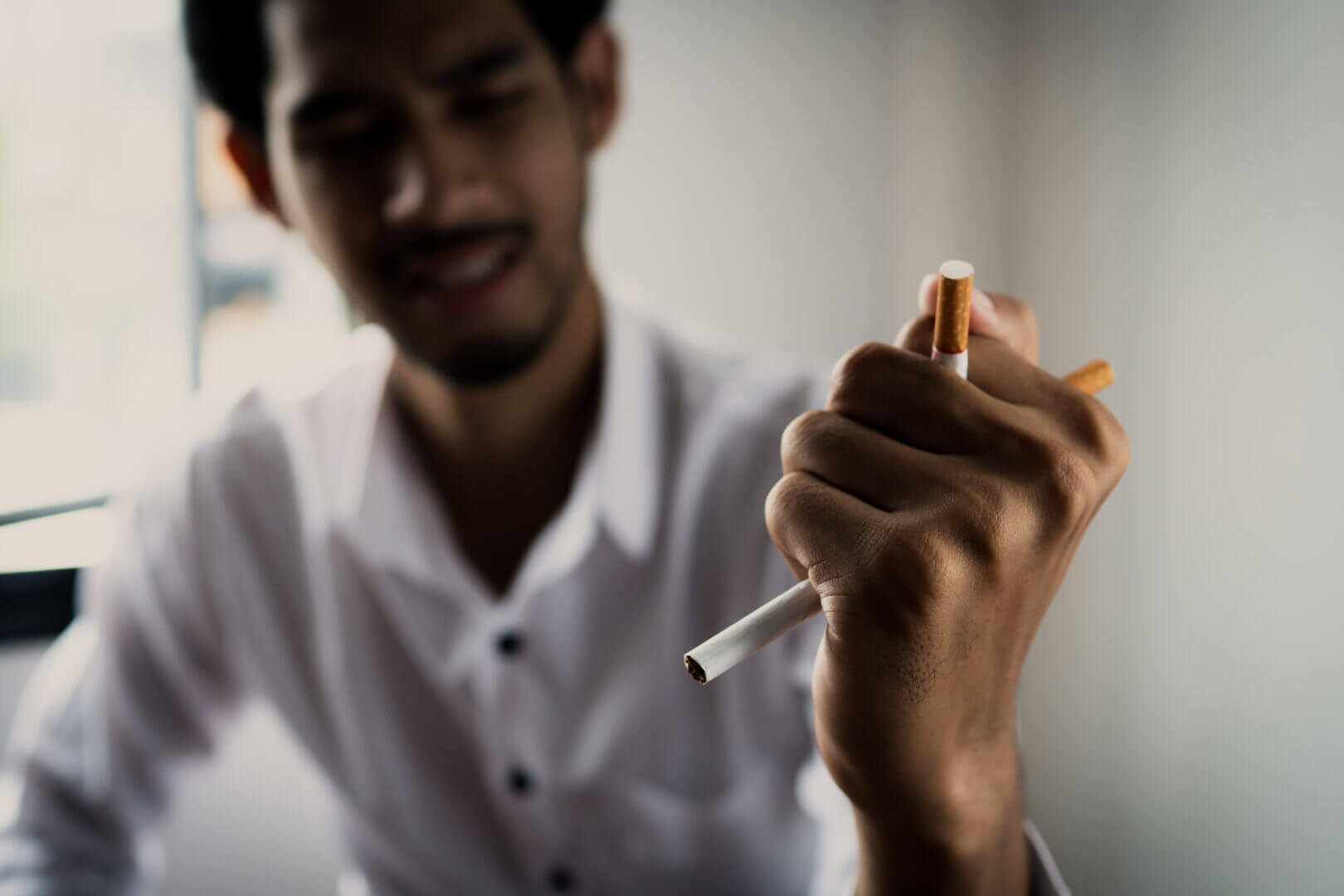 World No Tobacco Day in May, stop smoking concept, young man aga